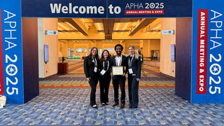 Health studies professor Nigel James with students