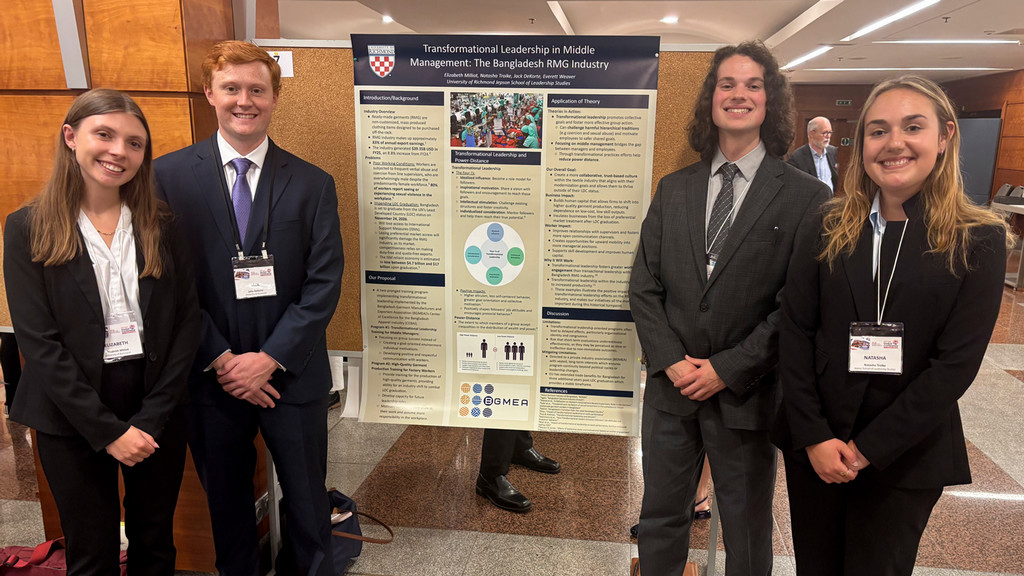 Jepson seniors Elizabeth Milliot, Jack DeKorte, Everett Weaver, and Natasha Troike at their poster session at the ILA Global Conference in Prague. 