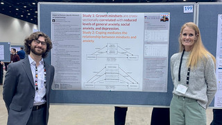 Senior Samuel Chanenson, left, presenting his research at the Society for Personality and Social Psychology Convention, accompanied by his faculty mentor, Dr. Crystal Hoyt