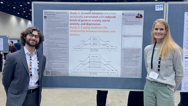 Senior Samuel Chanenson, left, presenting his research at the Society for Personality and Social Psychology Convention, accompanied by his faculty mentor, Dr. Crystal Hoyt