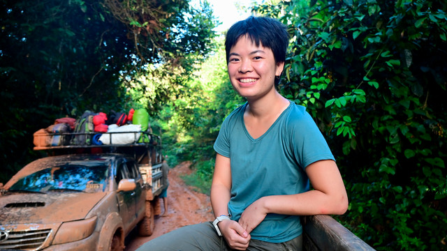 Senior Jasmine Lin in the back of a pick-up truck in the Amazon rainforest