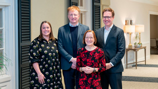 2025 Jepson School Alumni Award recipients Jessica Thompson, '15, Patrick Rucker, '96, and Kenneth Kraper, '05, pose with Dean Sandra Peart in the Jepson Alumni Center.