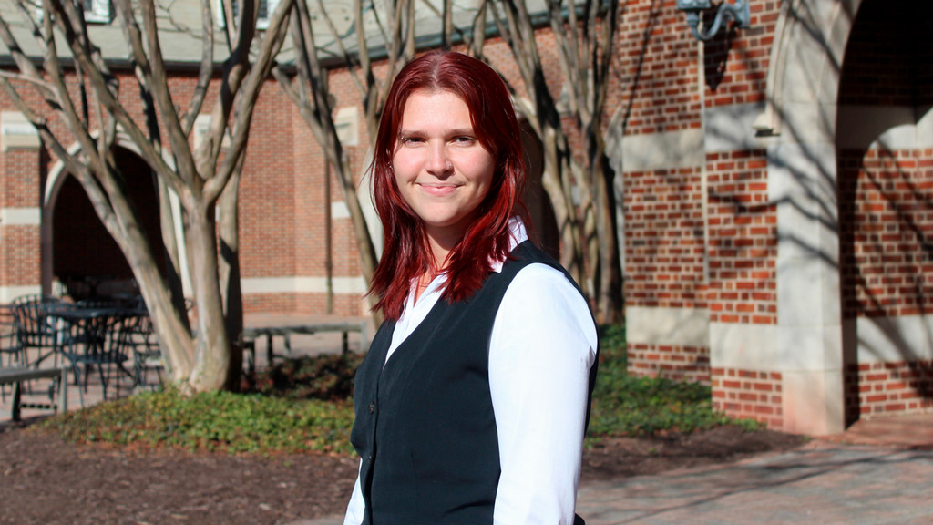Senior Andrea Punishill on Stern Plaza, outside Jepson Hall