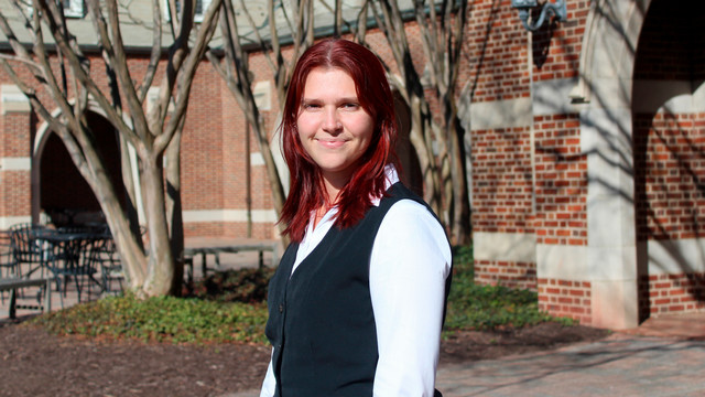 Senior Andrea Punishill on Stern Plaza, outside Jepson Hall