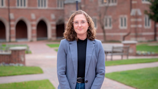 Senior Kate Chasin on Stern Plaza in front of the Humanities Building