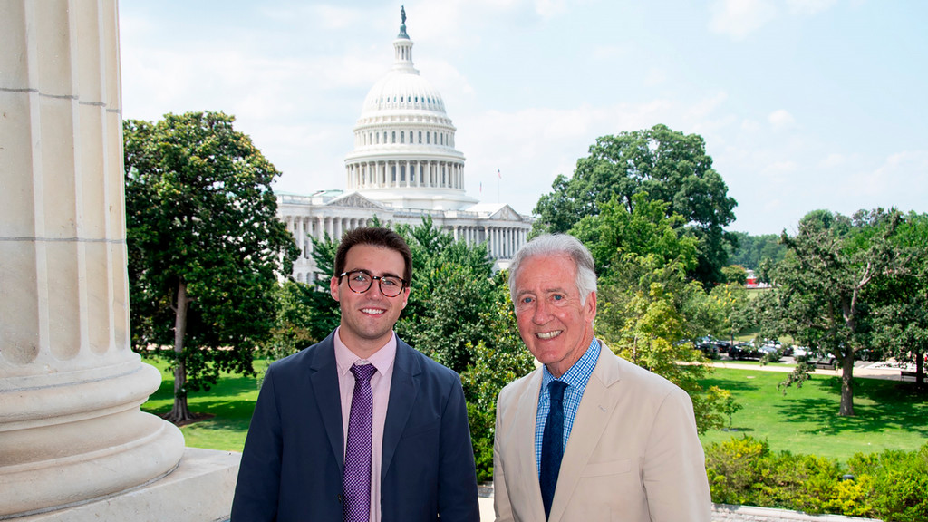 Senior Jacob Schumer standing near the Capitol with U.S. Rep. Richard Neal, D-Mass., the ranking member of the House Ways and Means Committee