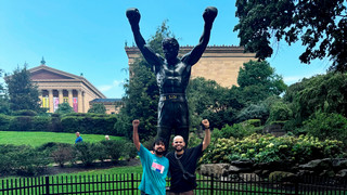 University of Richmond alums Marco Barcenas-Consuelo, '23, left, and Omar Ibrahim, '21, right, pose by the Rocky statue at the Philadelphia Museum of Art