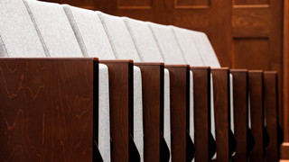 A photograph showing the symmetry of the chairs in the newly upgraded Moot Courtroom.