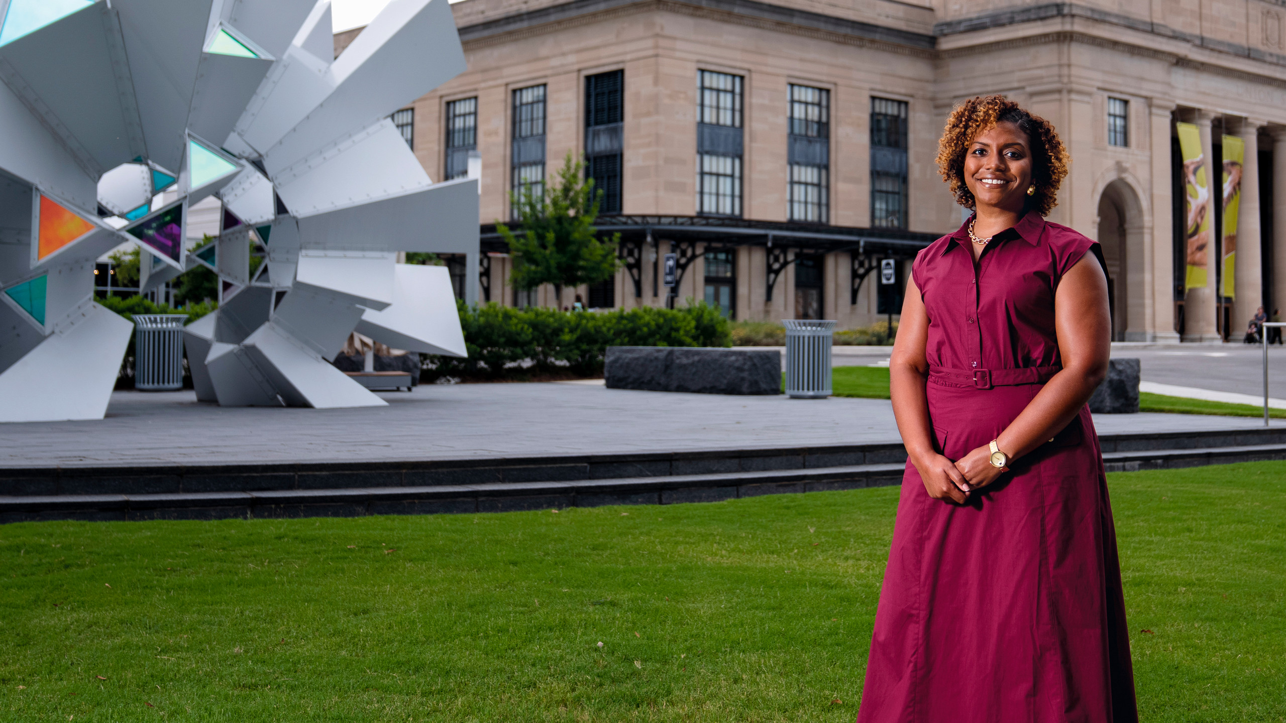 Danielle Stokes poses in front of the Virginia Science Museum.