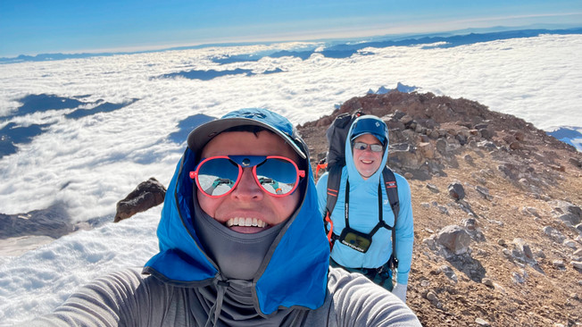 Rooksby atop Washington state’s Mt. Rainier with friend Gerry Simpson in 2021.