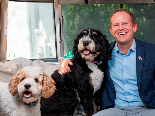 Dean of Richmond Law, Jacob Rooksby, with his dogs Hammie and Libby.