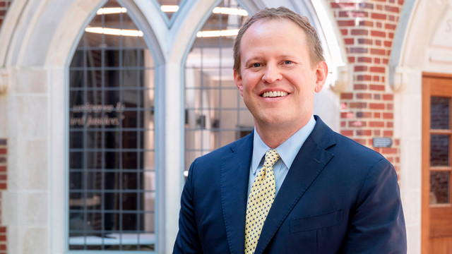 A headshot of new Law Dean Rooskby.