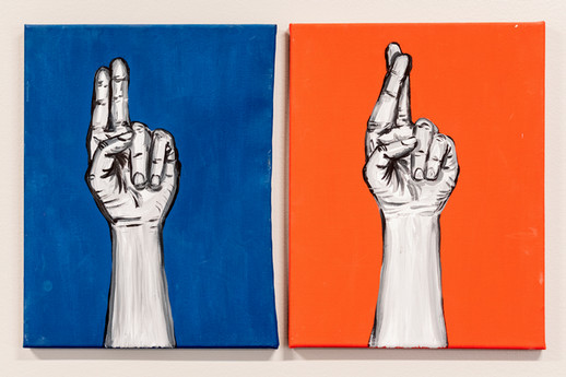 Two canvases, one blue, the other red, with paintings showing hands making the american sign language signs for 