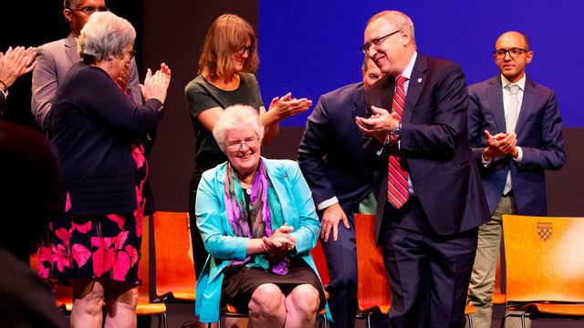 Dean Wendy Perdue being honored by colleagues at the 2025 Colloquy ceremony