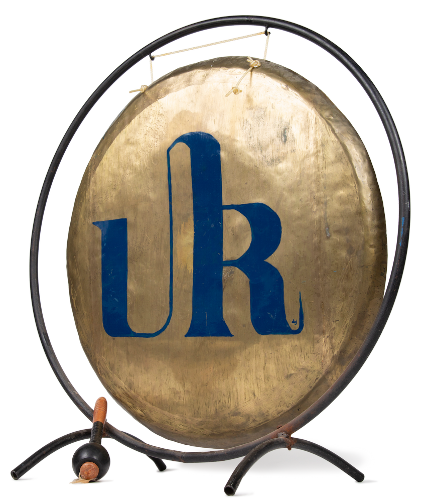 Large gong with past UR logo on front