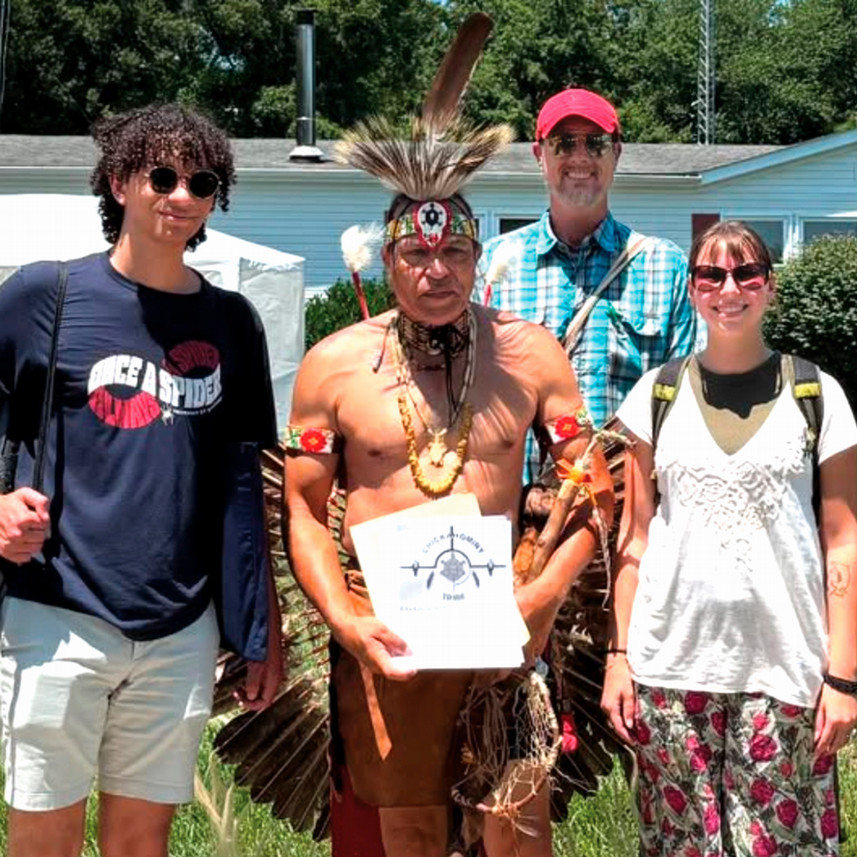 A photo of students Gus Dulaney-Dewald and Lily Greisch with David Salisbury, and Chickahominy tribesman Preston Adkins