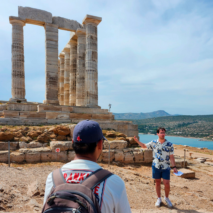Reece Steidle, ’27, gives a talk at the Temple of Poseidon