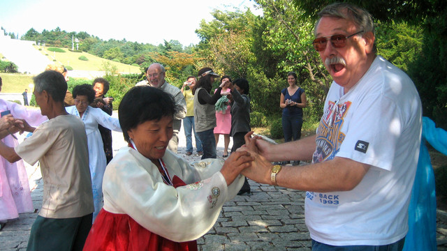 Watson Mills learning a new dance in North Korea.