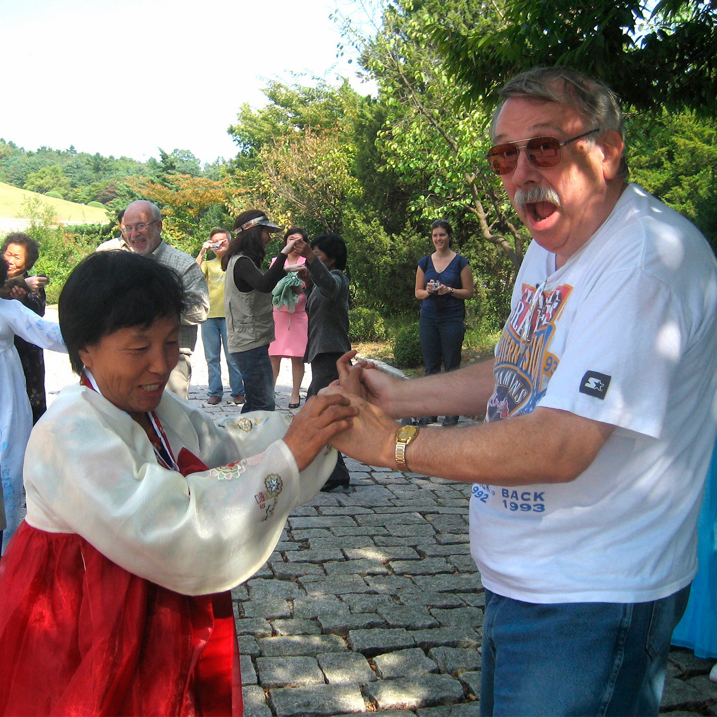 Watson Mills learning a new dance in North Korea.