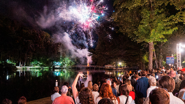 A photo of fireworks over the lake.