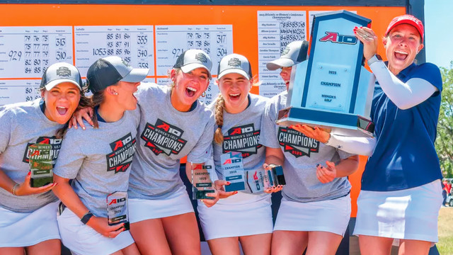 The women's golf team and coach Calle Barlow celebrate their A-10 championship win