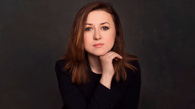 A headshot of Anca Dolly Chiriac.