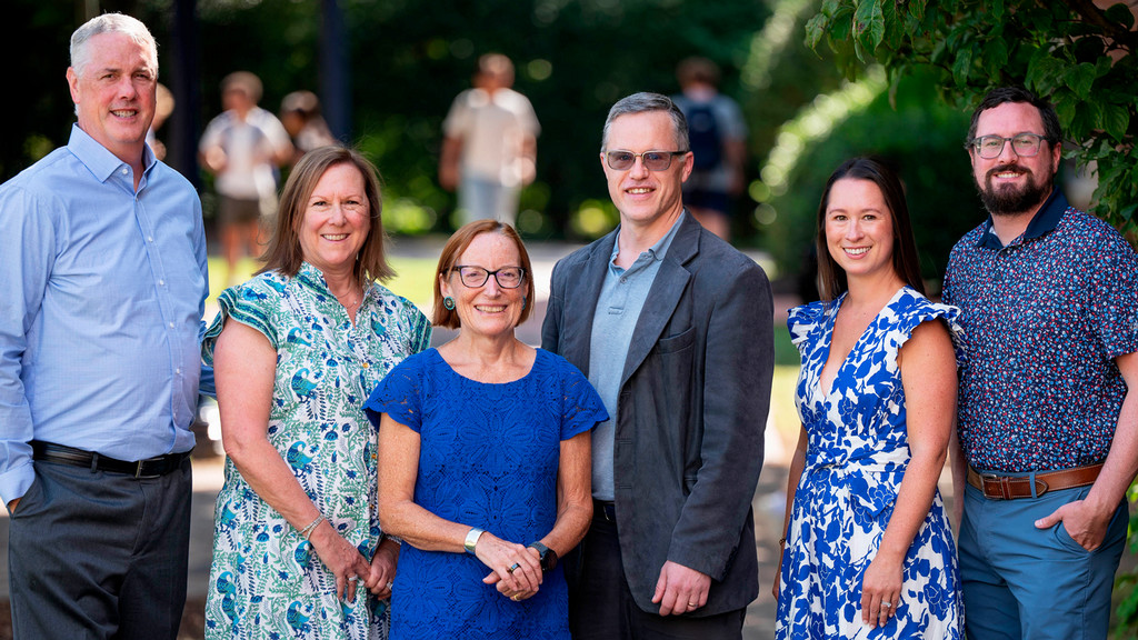 David and Laura Cramer and their family, along with Dean Sandra Peart and Christopher von Rueden