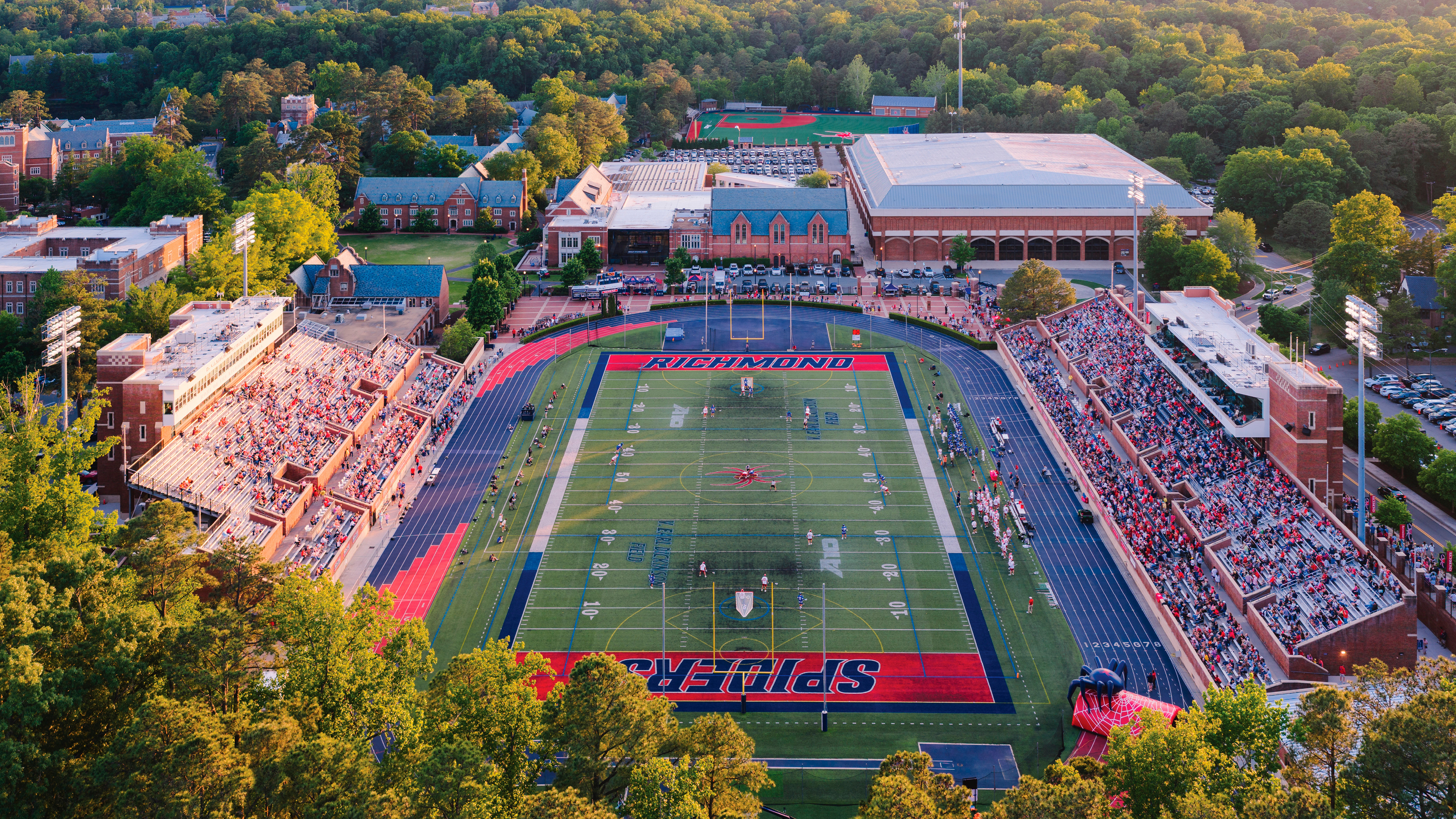 An aerial photo of Robins Stadium in the fall. The Robins Center and Pitt field are also visible in the background.