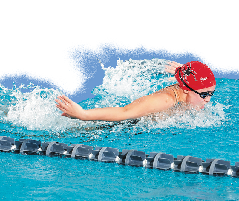 Swimmer Mali Kobelja in the pool doing the butterfly stroke. She is partially isolated from the background and there is a blue spray paint effect behind her.