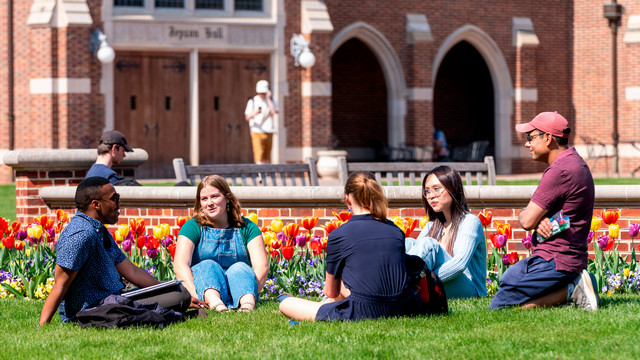 Students and professor at outdoor class near Jepson Hall