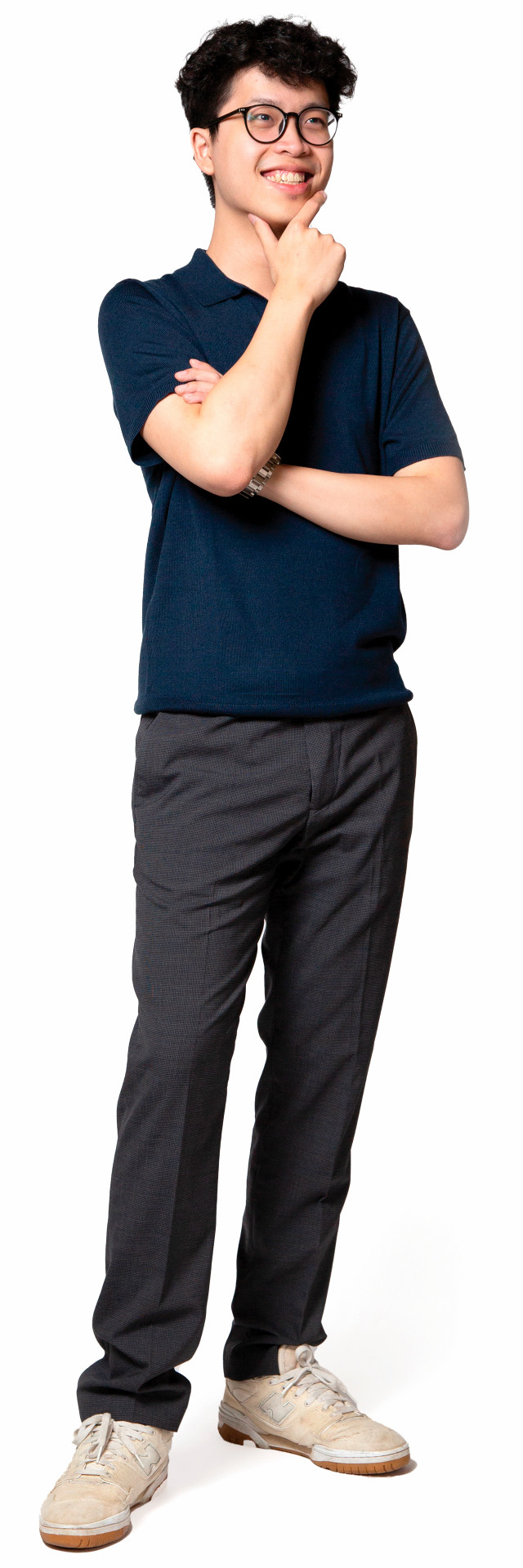 A photo of Ben Nguyen. He is smiling and holding one hand up to chin in a pose suggesting that he is thinking.