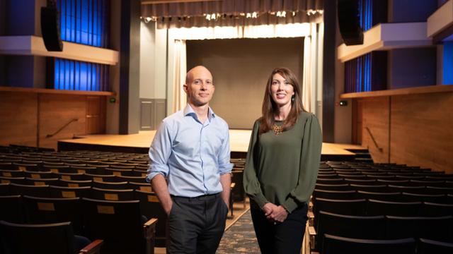 andy and joanna in a theater