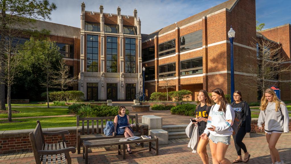 Students walk in front of Gottwald