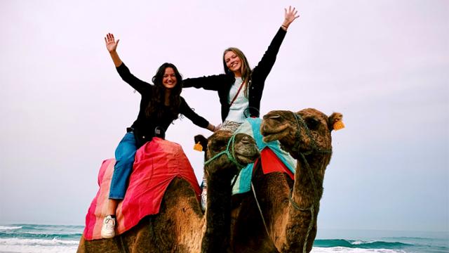 Sarah Clark (left) riding a camel on a Moroccan beach with her friend, Emma Miller. “It was a really cool experience, and the beach was beautiful,” said Clark, who took the photo.