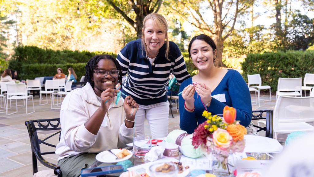 Tina Hallock at a fiber workshop with students.