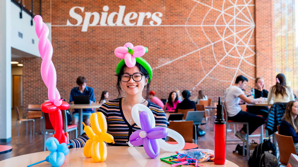 UR senior Miah Wilson with her balloon animals