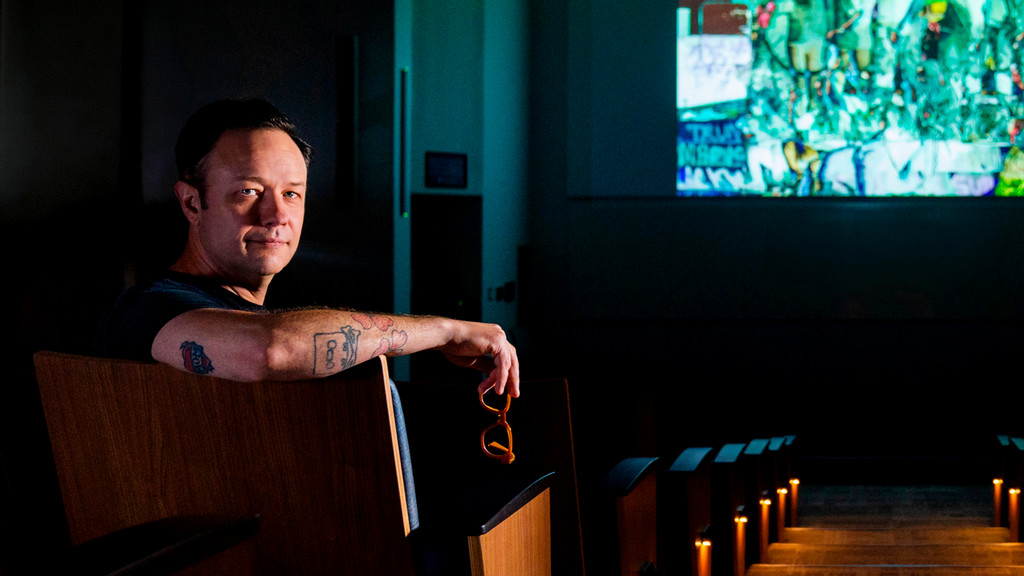 Jeremy Drummond watches his film Monument
