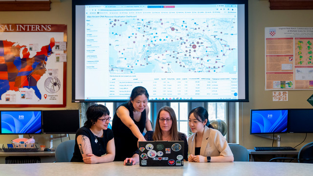 Biology professor Melinda Yang and geography professor Stephanie Spera with students