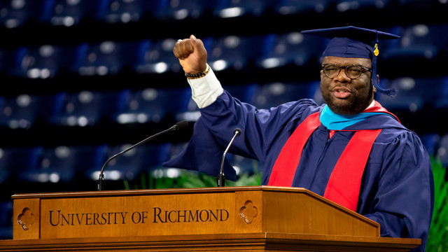 Tavorise Marks speaking at the University of Richmond podium during SPCS Commencement