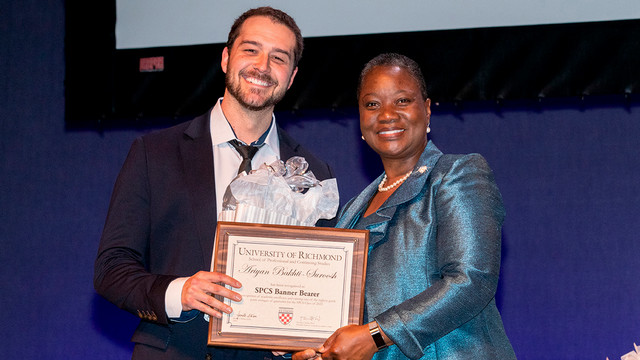 Ari receiving an award at SPCS Night