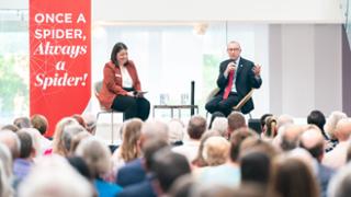 President Kevin Hallock speaking in front of an audience.