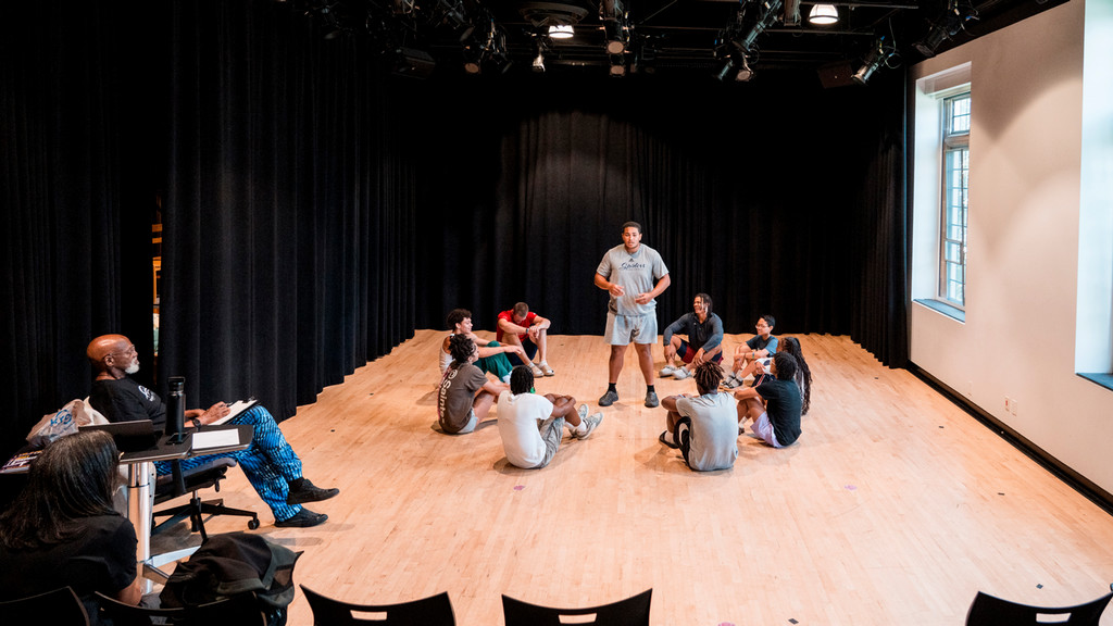 acting students rehearsing in a studio for a performance