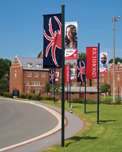 Several campus banners along the road.