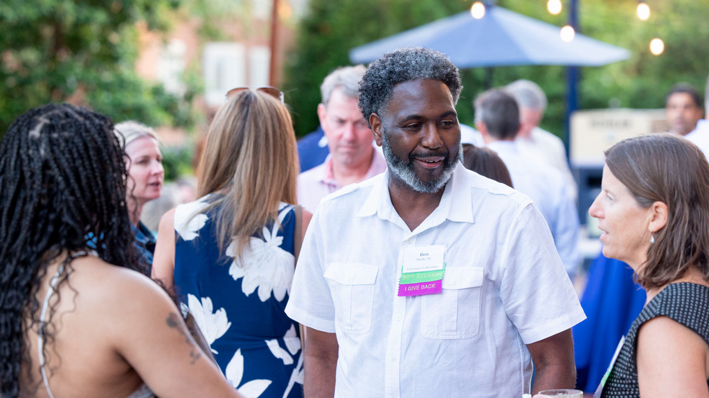 University of Richmond Alumni Conversing At Class Reunion