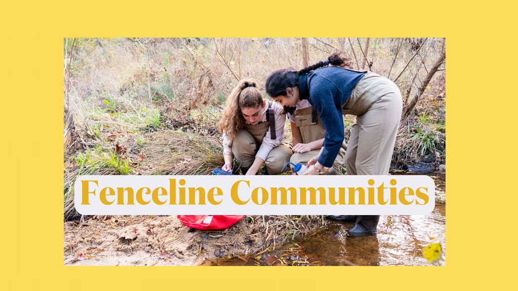 students testing water in a river