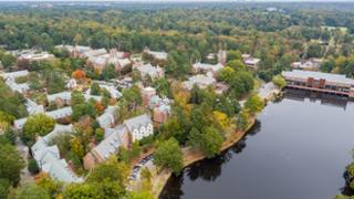 Aerial view of campus and Westhampton Lake.