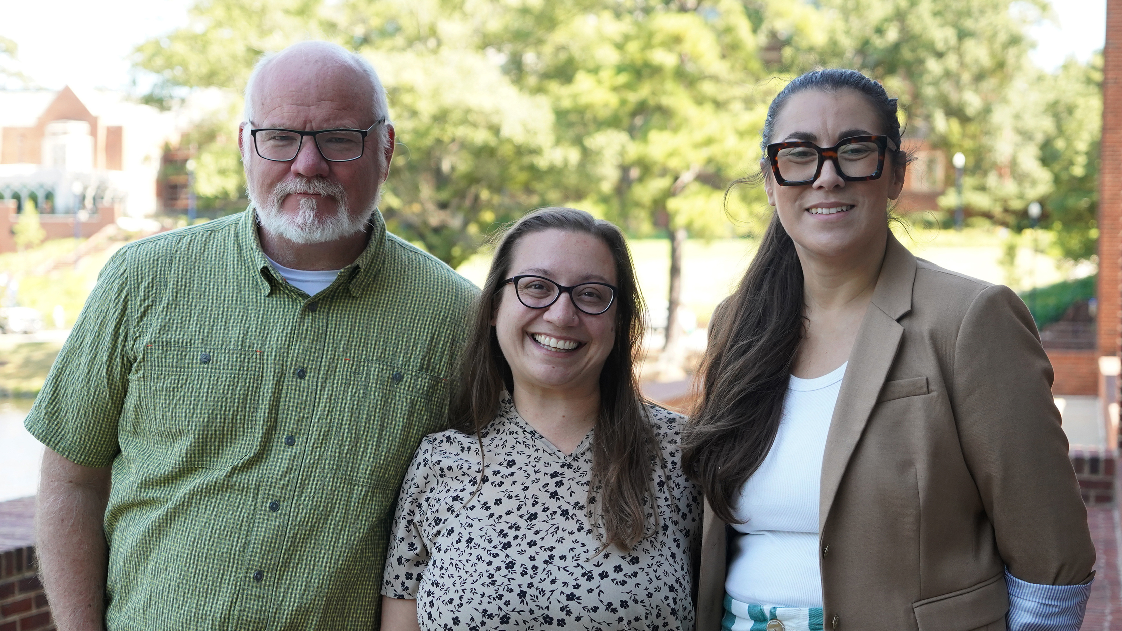 2025-26 Community partners in residence fellows, Ben Blevins, co-founder and CEO of the Highland Support Project, Leanne Petroziello, officer of educational success at the Community Foundation for a greater Richmond, and Victoria Yeroian, executive director of Podium
