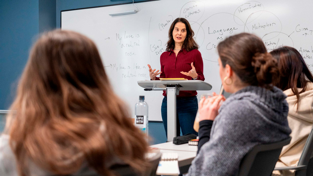 Professor instructing students