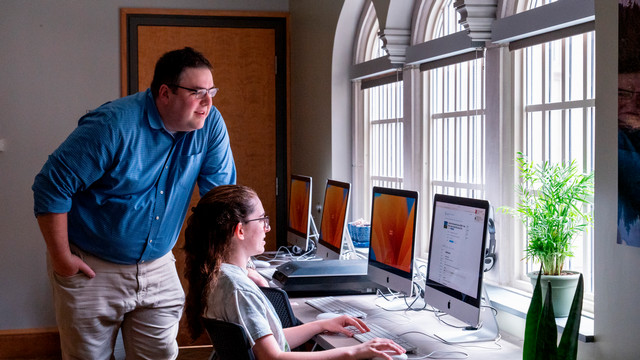 Faculty and student in computer lab
