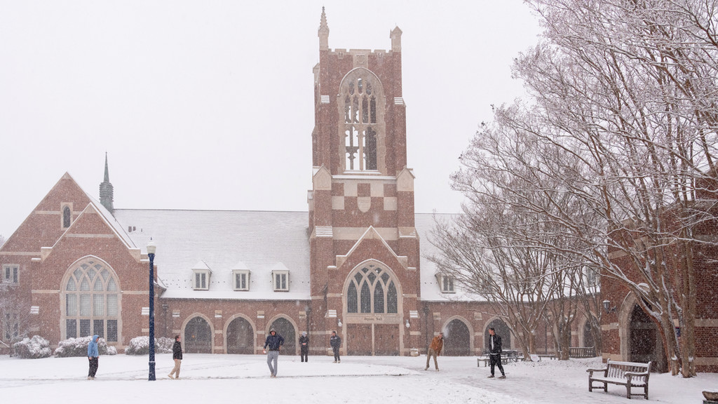 Students in the snow outside Jepson Hall